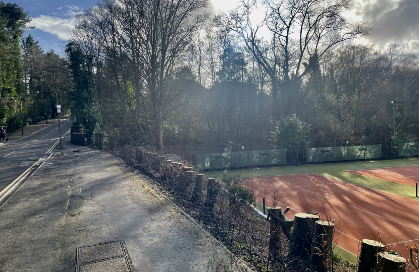 Pooled water caused by blocked road drainage meant that dirty water was sprayed by passing vehicles down the hill and on to the courts rendering them unplayable.