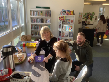 Cllr Linda Holt and Peter Crossen at Bramhall Library's Warm Space